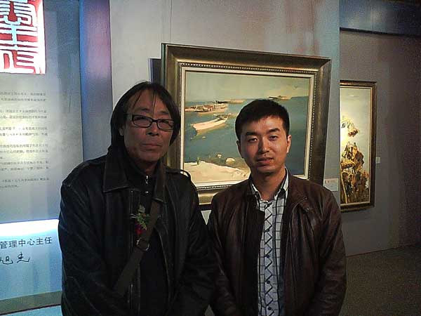 中国美术家协会会员、中国油画学会会员白羽平与《艺术天成》杂志社范畴部经理林少云端合影