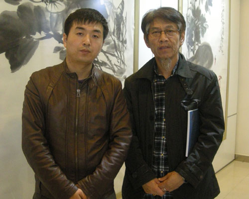 中国收藏家协会会员荆为平与林少云端合影