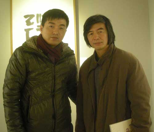 中国美术家协会会员、中国书法家协会会员、福建省美术家协会副主席林容生和《艺术天成》林少云端合影