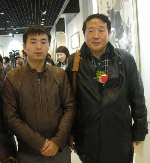 著名画家傅振江与林少云端合影
