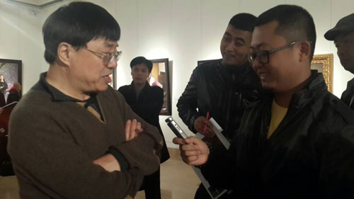 国家一级美术师、中国美术家协会会员、中国油画学会常务理事艾轩接受《艺术天成》主编杨洋采访
