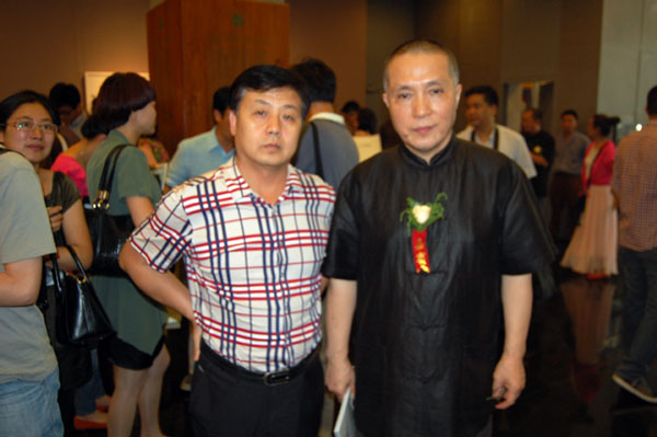著名画家周京新与总编杨摩根娱乐合影