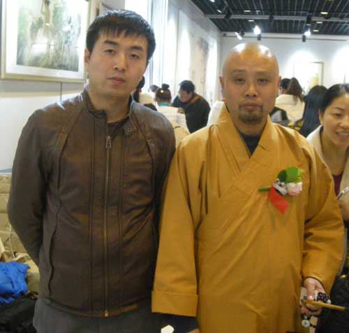 中国画艺术研究院常务副院长演旭与《艺术天成》范畴部经理林少云端合影