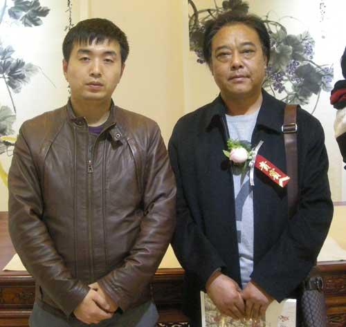 中国美术家协会会员、中国书画家协会理事刘玖桩与林少云端合影