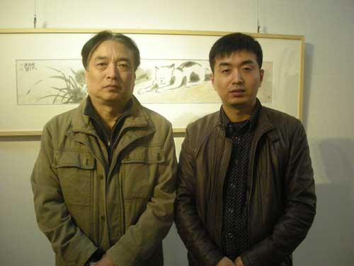 中国美术家协会会员化建国与林少云端合影