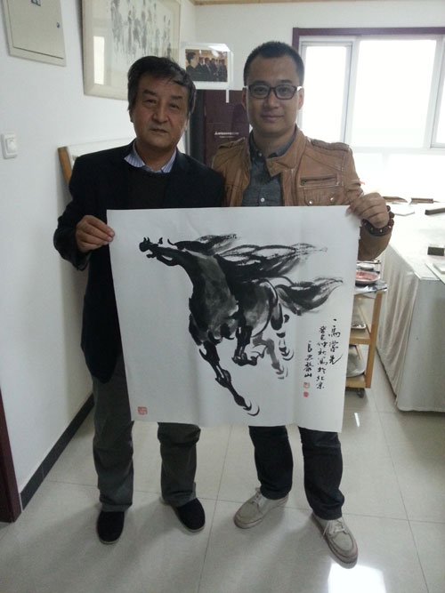 黎山先生与《艺术天成》课题策划经理高伟合影